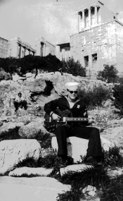 Dan with guitar below the Acropolis